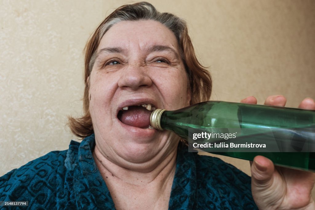 Toothless Homless Toothless Homeless Woman Opening A Metal Bottle Cap With Her Teeth ...