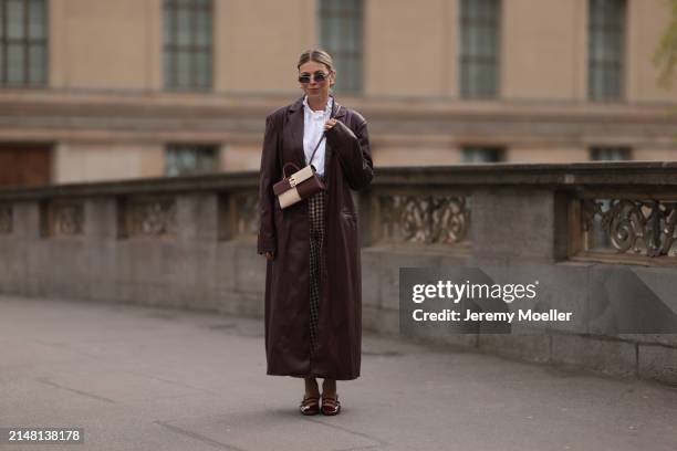 Aline Kaplan seen wearing Carolina Lemke gold sunglasses, gold earrings, Sézane white cotton ruffled button blouse / shirt, Sézane beige / brown...