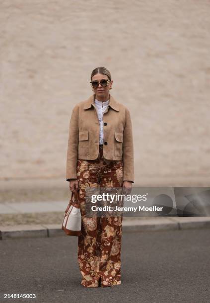 Aline Kaplan seen wearing Tibi brown sunglasses, gold earrings, Massimo Dutti beige / brown suede leather short jacket, Mango white cotton blouse,...