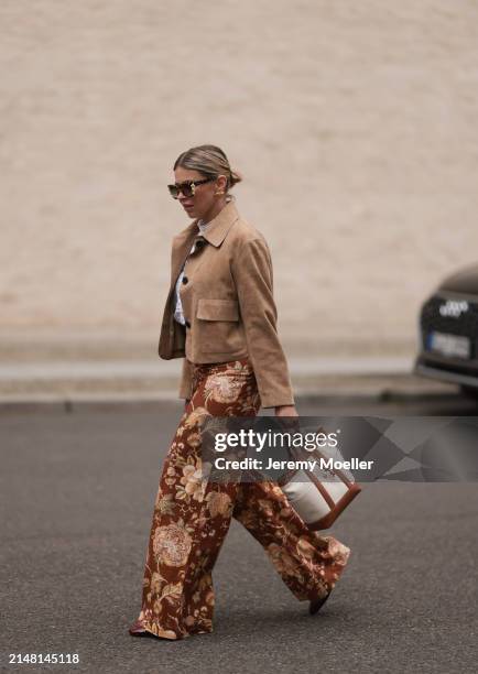 Aline Kaplan seen wearing Tibi brown sunglasses, gold earrings, Massimo Dutti beige / brown suede leather short jacket, Mango white cotton blouse,...