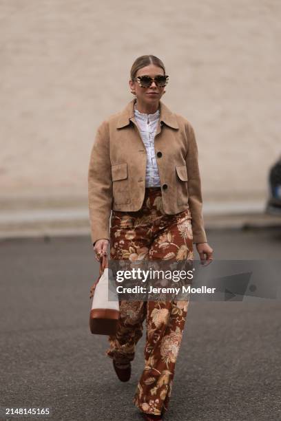 Aline Kaplan seen wearing Tibi brown sunglasses, gold earrings, Massimo Dutti beige / brown suede leather short jacket, Mango white cotton blouse,...