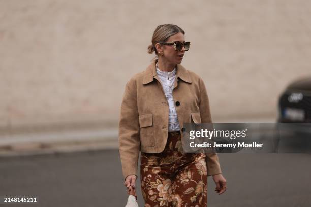 Aline Kaplan seen wearing Tibi brown sunglasses, gold earrings, Massimo Dutti beige / brown suede leather short jacket, Mango white cotton blouse,...
