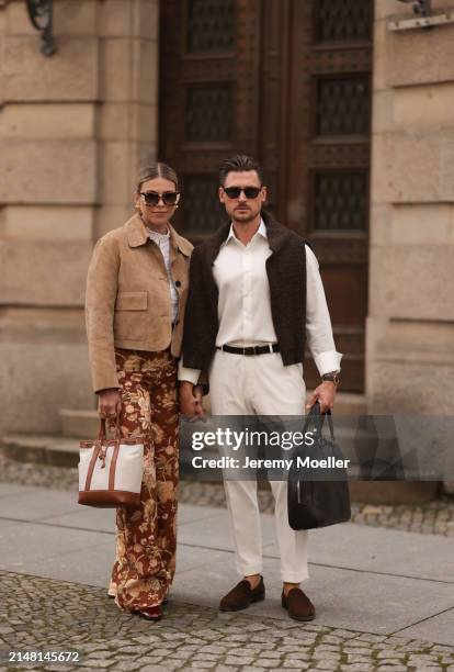 Aline Kaplan seen wearing Tibi brown sunglasses, gold earrings, Massimo Dutti beige / brown suede leather short jacket, Mango white cotton blouse,...