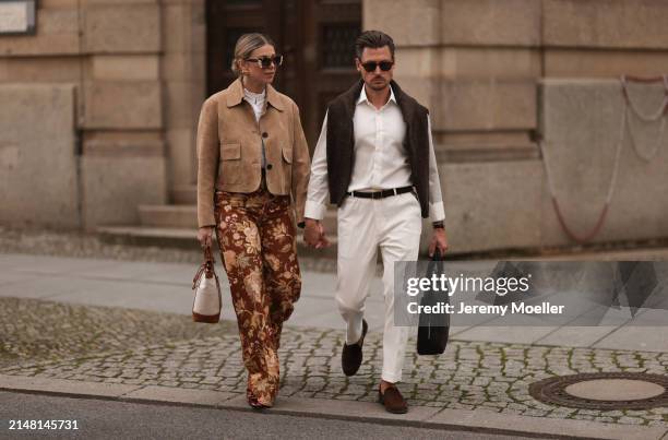 Aline Kaplan seen wearing Tibi brown sunglasses, gold earrings, Massimo Dutti beige / brown suede leather short jacket, Mango white cotton blouse,...