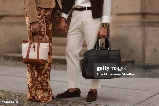 Aline Kaplan seen wearing Massimo Dutti beige / brown suede leather short jacket, Sézane yellow / brown flower pattern wide leg pants, Veronica Beard...