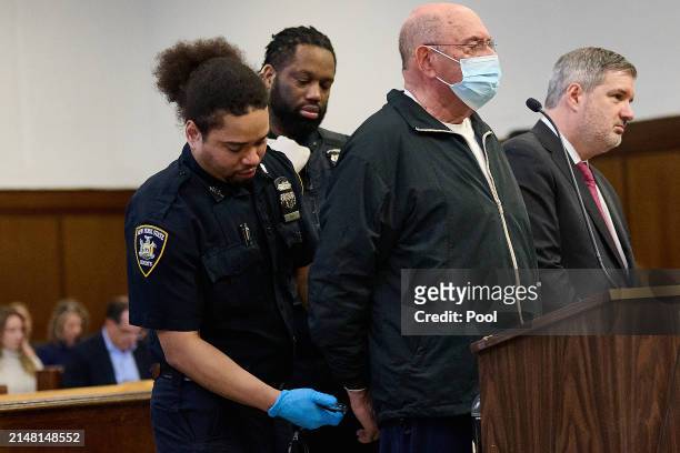 Former Trump Organization Finance Chief Allen Weisselberg is placed in handcuffs in the courtroom during his sentencing hearing at Manhattan Criminal...