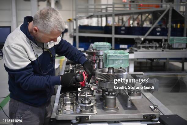 Workers at work inside of the new Hybrid and PHEV Vehicles Stellantis Group eDCT Assembly Plant on April 10, 2024 in Turin, Italy. The new Hybrid and...