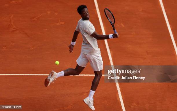 Gael Monfils of France plays a backhand volley against Daniil Medvedev during the Men's Singles Second Round match on day four of the Rolex...