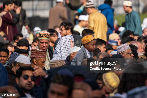 Hundreds of area Muslims participate in Eid al-Fitr in Brooklyn's Prospect Park on April 10, 2024 in New York City. The traditional prayer marks the...