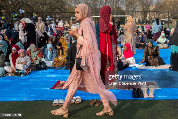 Hundreds of area Muslims participate in Eid al-Fitr in Brooklyn's Prospect Park on April 10, 2024 in New York City. The traditional prayer marks the...