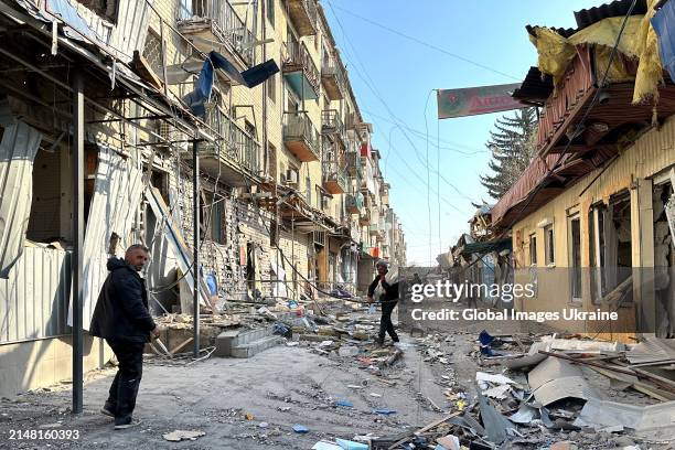 Multi-story residential building and stores remain heavily damaged by a Russian aerial bombing of a residential area with a KAB-500 guided bomb on...