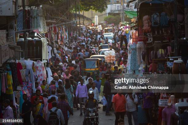 Muslim families shop on a busy street ahead of Eid al-Fitr on April 10, 2024 in Bengaluru, India. Muslims worldwide observe the Eid Al-Fitr prayer to...