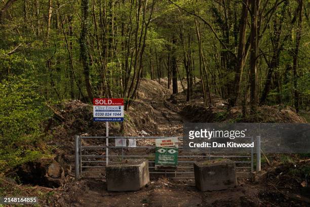The blocked entrance to Hoads Wood, the scene of Illegally dumped commercial waste on April 09, 2024 in Ashford, Kent. Hoads wood in Kent is a 199...