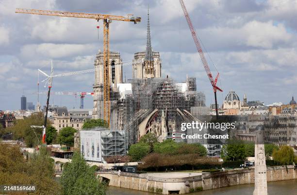 Notre-Dame de Paris Cathedral and its new spire are seen almost five years after fire ravaged the emblematic monument on April 10, 2024 in Paris,...