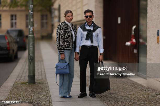 Aline Kaplan seen wearing gold heart shaped earrings, Sézane black / white flower embroidered jacket, Mango white cotton blouse, Citizen Of Humanity...