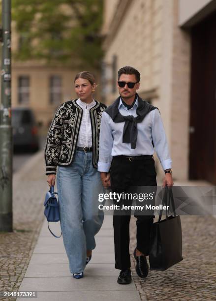 Aline Kaplan seen wearing gold heart shaped earrings, Sézane black / white flower embroidered jacket, Mango white cotton blouse, Citizen Of Humanity...
