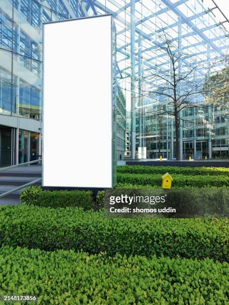 office front with blank digital billboard in city of london - vertical banner stock pictures, royalty-free photos & images
