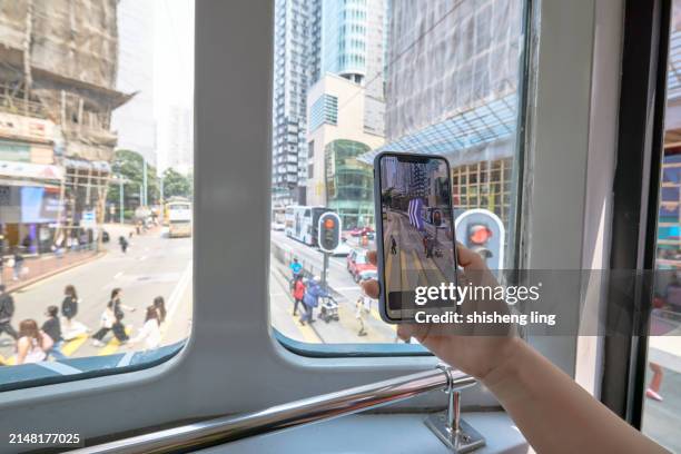 use 3d navigation to find museum on mobile phone. the concept of augmented reality technology - toegevoegde realiteit stockfoto's en -beelden