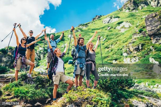 friends hiking in rila mountains - nordic walking group stock pictures, royalty-free photos & images