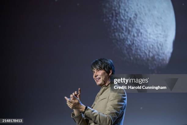 Professor Brian Cox joins IWC Schaffhausen at Watches and Wonders on April 10, 2024 in Geneva, Switzerland.