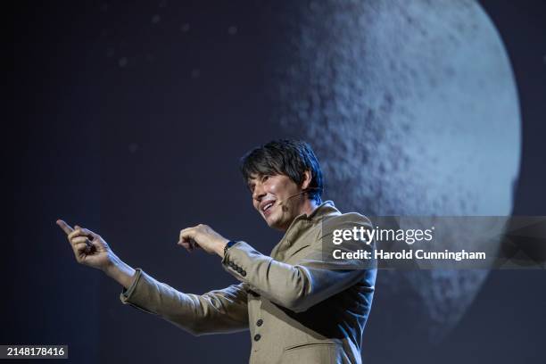 Professor Brian Cox joins IWC Schaffhausen at Watches and Wonders on April 10, 2024 in Geneva, Switzerland.