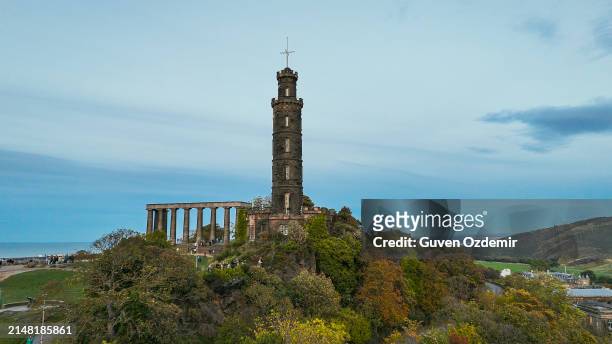 aerial view of calton hill, edinburgh sunset aerial view, gothic revival architecture in scotland, view of edinburgh city center from calton hill - old national centre stock pictures, royalty-free photos & images
