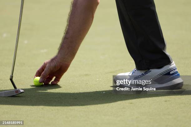 Nick Faldo of England shoes are seen on the second green during the Par Three Contest prior to the 2024 Masters Tournament at Augusta National Golf...