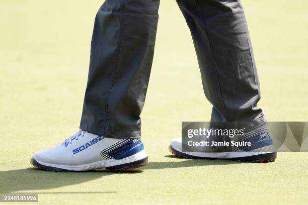 Nick Faldo of England shoes are seen on the second green during the Par Three Contest prior to the 2024 Masters Tournament at Augusta National Golf...