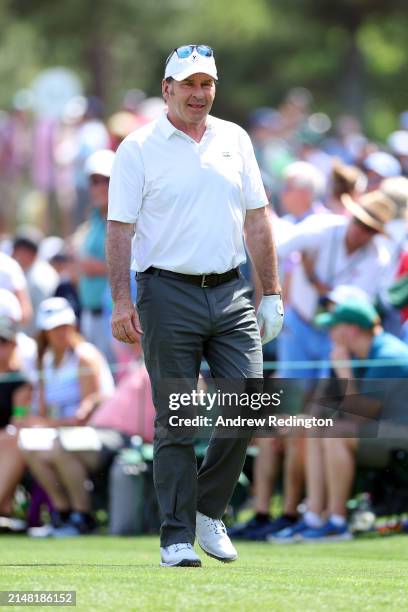 Nick Faldo of England walks off the second tee during the Par Three Contest prior to the 2024 Masters Tournament at Augusta National Golf Club on...