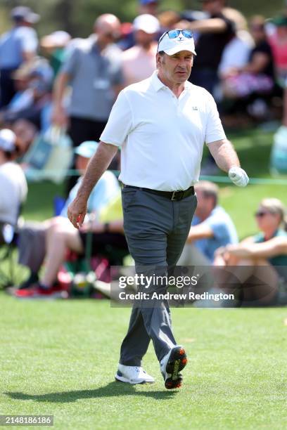 Nick Faldo of England walks the second hole during the Par Three Contest prior to the 2024 Masters Tournament at Augusta National Golf Club on April...