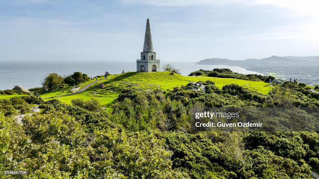 Aerial view of the Obelisk on Killiney Hill in Wicklow-Ireland, Killiney Obelisk, popular tourist destinations in ireland, people enjoy the view next to the monument on the hill, view hill
