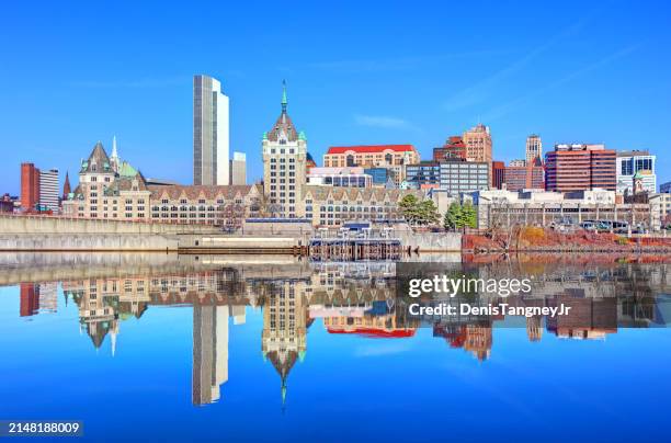 albany skyline reflection on the hudson river - albany new york state stock pictures, royalty-free photos & images