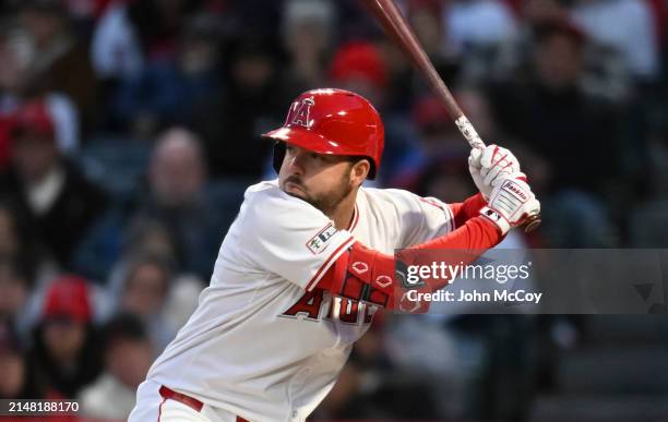 Nolan Schanuel of the Los Angeles Angels uses a custom logo on the knob of his bat while playing the Boston Red Sox in a Major League Baseball game...