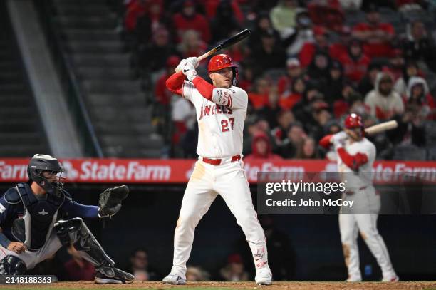 Mike Trout of the Los Angeles Angels looks on during an at-bat against the Boston Red Sox in a Major League Baseball game at Angel Stadium of Anaheim...