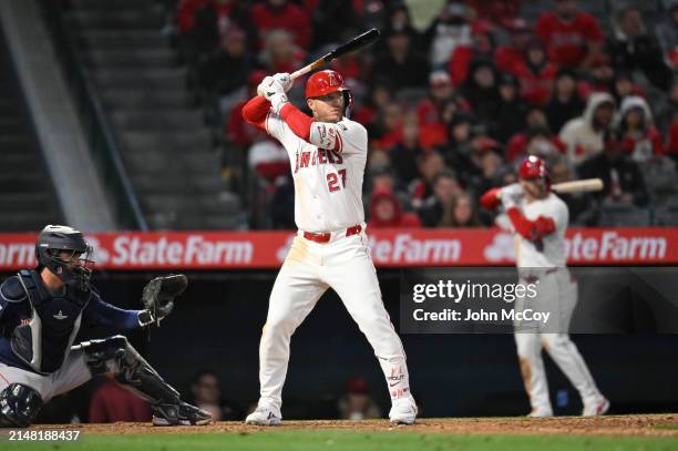 Mike Trout of the Los Angeles Angels looks on during an at-bat against the Boston Red Sox in a Major League Baseball game at Angel Stadium of Anaheim...