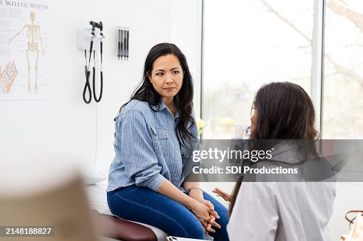 Woman becomes serious as unrecognizable female doctor gives advice Woman becomes serious as unrecognizable female doctor gives advice