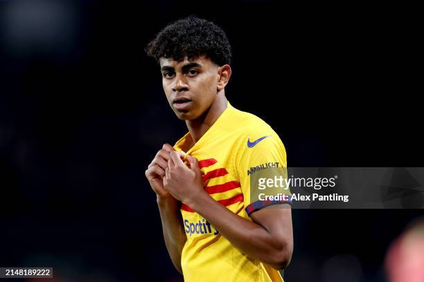 Lamine Yamal of FC Barcelona looks on during the UEFA Champions League quarter-final first leg match between Paris Saint-Germain and FC Barcelona at...