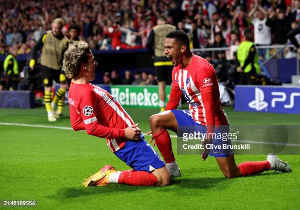 Samuel Lino of Atletico Madrid celebrates scoring his team's second goal with teammate Antoine Griezmann during the UEFA Champions League...