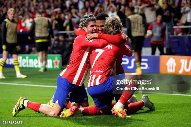 Samuel Lino of Atletico Madrid celebrates scoring his team's second goal with teammates Antoine Griezmann and Rodrigo De Paul of Atletico Madrid...