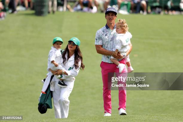 Thorbjørn Olesen of Denmark walks to the second hole with his family during the Par Three Contest prior to the 2024 Masters Tournament at Augusta...