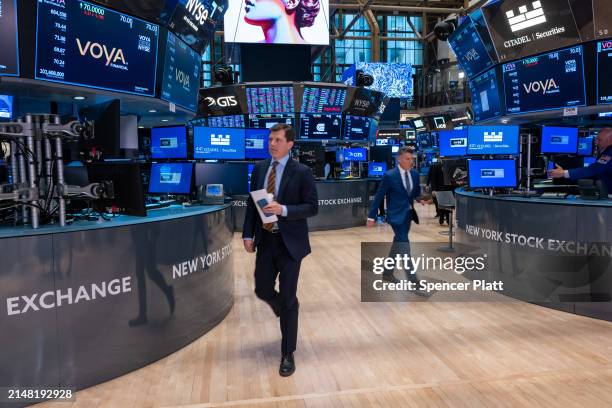 Traders work on the floor of the New York Stock Exchange on April 10, 2024 in New York City. As new inflation data released today showed a continued...