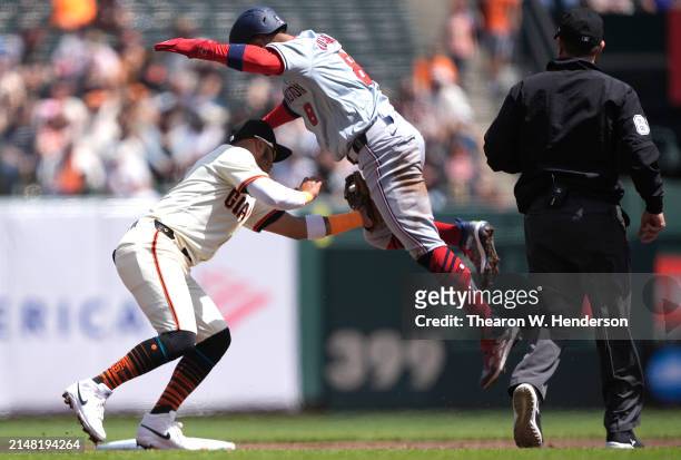 Eddie Rosario of the Washington Nationals is caught stealing and tagged out by Thairo Estrada of the San Francisco Giants in the top of the second...