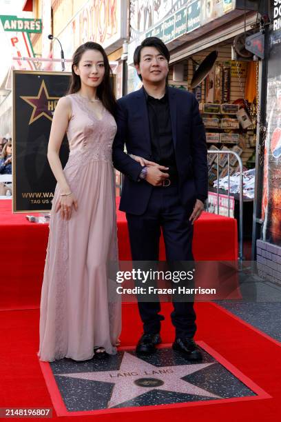 Gina Alice Redlinger and Classical Pianist Lang Lang, who was honored with the 2,778th star on the Hollywood Walk of Fame on April 10, 2024 in...