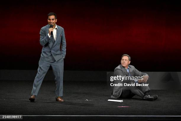 Lionsgate Motion Picture Group Chair Adam Fogelson watches as Aziz Ansari speaks during the Lionsgate presentation during CinemaCon 2024 at The...