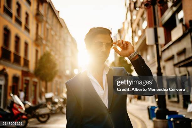 upper class people in the city - eitelkeit stock-fotos und bilder