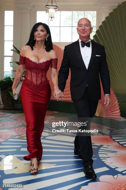 Amazon founder Jeff Bezos and his fiancee Lauren Sanchez arrive at the White House for a state dinner on April 10, 2024 in Washington, DC. U.S....