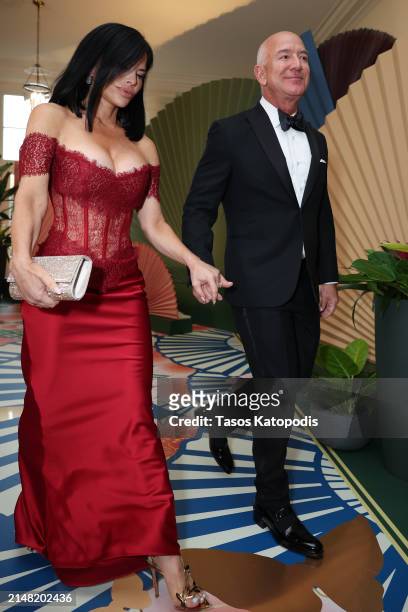 Amazon founder Jeff Bezos and his fiancee Lauren Sanchez arrive at the White House for a state dinner on April 10, 2024 in Washington, DC. U.S....