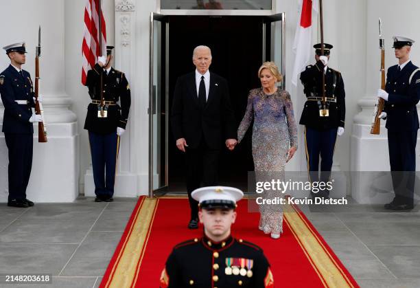 President Joe Biden and first lady Jill Biden wait to welcome Japanese Prime Minister Fumio Kishida and his wife Yuko Kishida to the White House for...