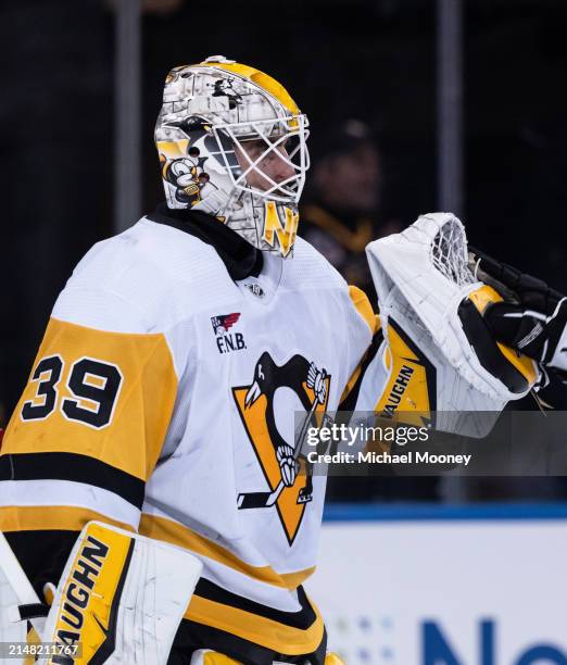 Alex Nedeljkovic of the Pittsburgh Penguins celebrates a win over the New York Rangers at Madison Square Garden on April 01, 2024 in New York City.