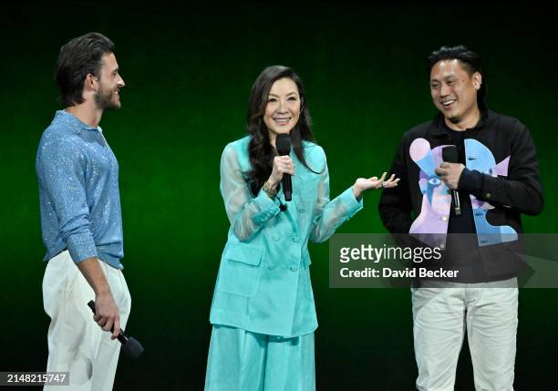 Jonathan Bailey, Michelle Yeoh and Jon M. Chu speak onstage during the Universal Pictures and Focus Features Presentation during CinemaCon 2024 at...
